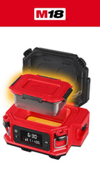 M18™ Jobsite Lunch Warmer in red and black, shown open with a clear plastic food container resting inside. The M18 logo appears in a red banner at the top.